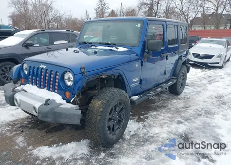 2009 Jeep Wrangler Unlimited Sahara z USA, uszkodzony, nr VIN 1J4GA59129L712696